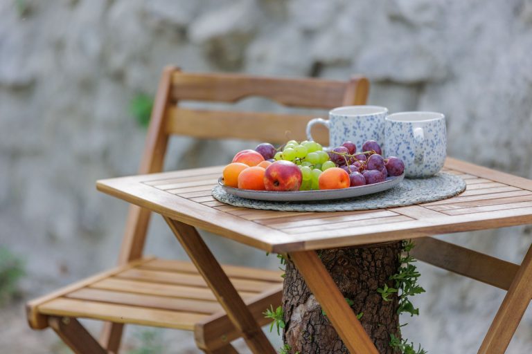 Villa Oros Corfu exterior wooden table with chair
